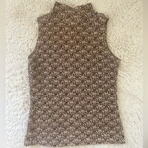 Brown and Tan 
Size is medium